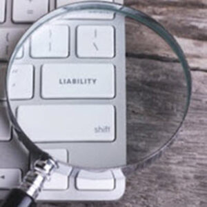 Liability word on a laptop keyboard