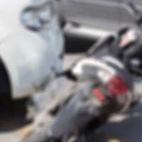 Motorcycle accident against a car